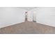 Neutral carpeting bedroom with a closet at 7536 Sw 60Th St, Ocala, FL 34476
