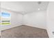 Bedroom with neutral carpeting and window view at 7536 Sw 60Th St, Ocala, FL 34476
