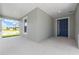 Inviting front porch and blue front door offer an inviting outdoor space for relaxing and enjoying neighborhood views at 7536 Sw 60Th St, Ocala, FL 34476