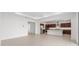 Open floor plan showcases a spacious living area that flows into a kitchen with stainless appliances at 7536 Sw 60Th St, Ocala, FL 34476