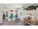 Bright bedroom featuring neutral walls, a large window, and colorful decor to create a cheerful atmosphere at 8647 Sw 44Th Ter, Ocala, FL 34476