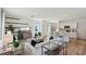 Spacious living room with an open floor plan, featuring a modern decor, seamless living and entertaining at 8647 Sw 44Th Ter, Ocala, FL 34476