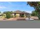 Expansive backyard showcasing stone landscaping, lush greenery, and a charming fountain, perfect for outdoor living at 8650 Sw 83Rd Loop, Ocala, FL 34481