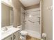 Renovated bathroom with a shower unit, commode, and vanity at 8650 Sw 83Rd Loop, Ocala, FL 34481