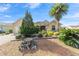 Inviting home with lush landscaping, a stately palm tree, and decorative rock garden at 8650 Sw 83Rd Loop, Ocala, FL 34481