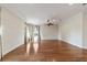 Large living room with hardwood flooring and natural light and view of backyard at 8650 Sw 83Rd Loop, Ocala, FL 34481
