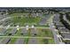 Aerial view of a home in a residential neighborhood with a green area at 8870 Sw 62Nd Ave, Ocala, FL 34476