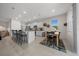 Open kitchen with island and bar stool seating and bright breakfast nook in view at 8870 Sw 62Nd Ave, Ocala, FL 34476