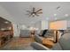 Spacious living room with tile floors with kitchen in view and comfortable seating at 8870 Sw 62Nd Ave, Ocala, FL 34476