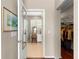 Hallway view into a bathroom with vanity and closet at 9628 Sw 90Th St, Ocala, FL 34481