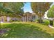Charming one-story home with manicured lawn and mature trees at 9628 Sw 90Th St, Ocala, FL 34481