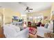 Bright living room featuring hardwood floors, two sofas, and views of the outdoors at 9628 Sw 90Th St, Ocala, FL 34481