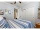 Bright bedroom with neutral walls and a spacious closet at 9642 Sw 95Th Loop, Ocala, FL 34481