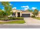 Charming home featuring a two-car garage and lush landscaping at 9642 Sw 95Th Loop, Ocala, FL 34481