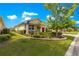 Charming home with a well-manicured lawn and a neatly landscaped garden at 9642 Sw 95Th Loop, Ocala, FL 34481