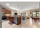Open kitchen provides seamless flow to living spaces and features stainless steel appliances at 9642 Sw 95Th Loop, Ocala, FL 34481