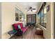 Enclosed sunroom with comfortable seating and views of the backyard at 9642 Sw 95Th Loop, Ocala, FL 34481