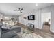 Open concept living space with dining area and view into the kitchen at 10427 Sw 98Th Place Rd, Ocala, FL 34481