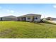 Expansive backyard is perfect for outdoor activities and features lush green grass at 10569 Sw 98Th Pl, Ocala, FL 34481