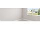 Light and airy bedroom with neutral walls, a large window, and plenty of natural light at 10569 Sw 98Th Pl, Ocala, FL 34481