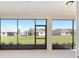 Spacious lanai overlooking the backyard offers a relaxing outdoor living space with scenic views at 10569 Sw 98Th Pl, Ocala, FL 34481