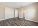 Large bedroom with hardwood floors, closet, and en-suite bathroom at 10976 Sw 101St Loop, Ocala, FL 34481