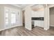 Stylish butler pantry featuring white cabinets, sleek countertops, and a convenient beverage cooler at 10976 Sw 101St Loop, Ocala, FL 34481