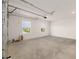 This garage features an automatic door, and windows for natural light at 10976 Sw 101St Loop, Ocala, FL 34481