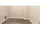 This laundry room features base molding and wood-look floors at 10976 Sw 101St Loop, Ocala, FL 34481