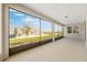 This covered patio has a beautiful view of the backyard at 10976 Sw 101St Loop, Ocala, FL 34481