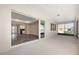 This covered patio features a view into the living area and the backyard at 10976 Sw 101St Loop, Ocala, FL 34481