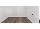 Walk-in closet with wire shelving and hardwood flooring at 10977 Sw 101St Loop, Ocala, FL 34481