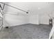 Spacious two-car garage with automatic door and epoxy flooring at 10977 Sw 101St Loop, Ocala, FL 34481