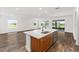 Bright, open kitchen with white countertops and stainless steel appliances enhance the cooking experience at 10977 Sw 101St Loop, Ocala, FL 34481