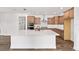 Beautiful kitchen with a large island, modern appliances, and ample counter space for cooking at 10977 Sw 101St Loop, Ocala, FL 34481