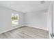 Bedroom featuring natural light and light wood floors at 13316 Sw 105Th Pl, Dunnellon, FL 34432