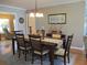 Charming dining area with wooden table, chairs, and decorative accents at 13762 Sw 112Th Ter, Dunnellon, FL 34432