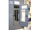 Modern electrical panel featuring organized breakers and safety labels for home power distribution at 13762 Sw 112Th Ter, Dunnellon, FL 34432