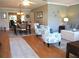 Elegant living room and dining area with natural light from windows and entryways at 13762 Sw 112Th Ter, Dunnellon, FL 34432