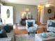 Inviting living room showcasing furniture and neutral décor that offer comfort and style at 13762 Sw 112Th Ter, Dunnellon, FL 34432