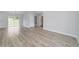Spacious living area features modern floors and plenty of natural light with an open floor plan at 13793 Sw 100 Ln, Dunnellon, FL 34432