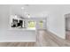 Modern kitchen featuring stainless steel appliances, island and contemporary floors at 15155 Sw 30 St, Ocala, FL 34481
