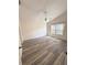 Bright, spacious bedroom with modern floors and a ceiling fan at 2209 Ne 40Th Ave, Ocala, FL 34470