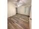 Inviting bedroom with lots of natural light, a fan and a walk-in closet at 2209 Ne 40Th Ave, Ocala, FL 34470