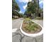 Welcoming neighborhood entrance island with landscaping and clear street signage at 2209 Ne 40Th Ave, Ocala, FL 34470