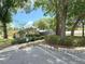 Well-manicured community with mature trees, sidewalks, and handicap access at 2209 Ne 40Th Ave, Ocala, FL 34470