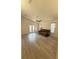 Open living room with modern floors, fan, and sliding door to a patio at 2209 Ne 40Th Ave, Ocala, FL 34470