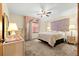 Comfortable bedroom features neutral colors, a bed, and natural light creating a peaceful retreat for relaxation at 2416 Se 15Th St, Ocala, FL 34471