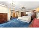 Spacious bedroom with built-in storage and a ceiling fan at 2416 Se 15Th St, Ocala, FL 34471