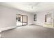 Bonus room with sliding glass doors leading to an outdoor patio at 2416 Se 15Th St, Ocala, FL 34471